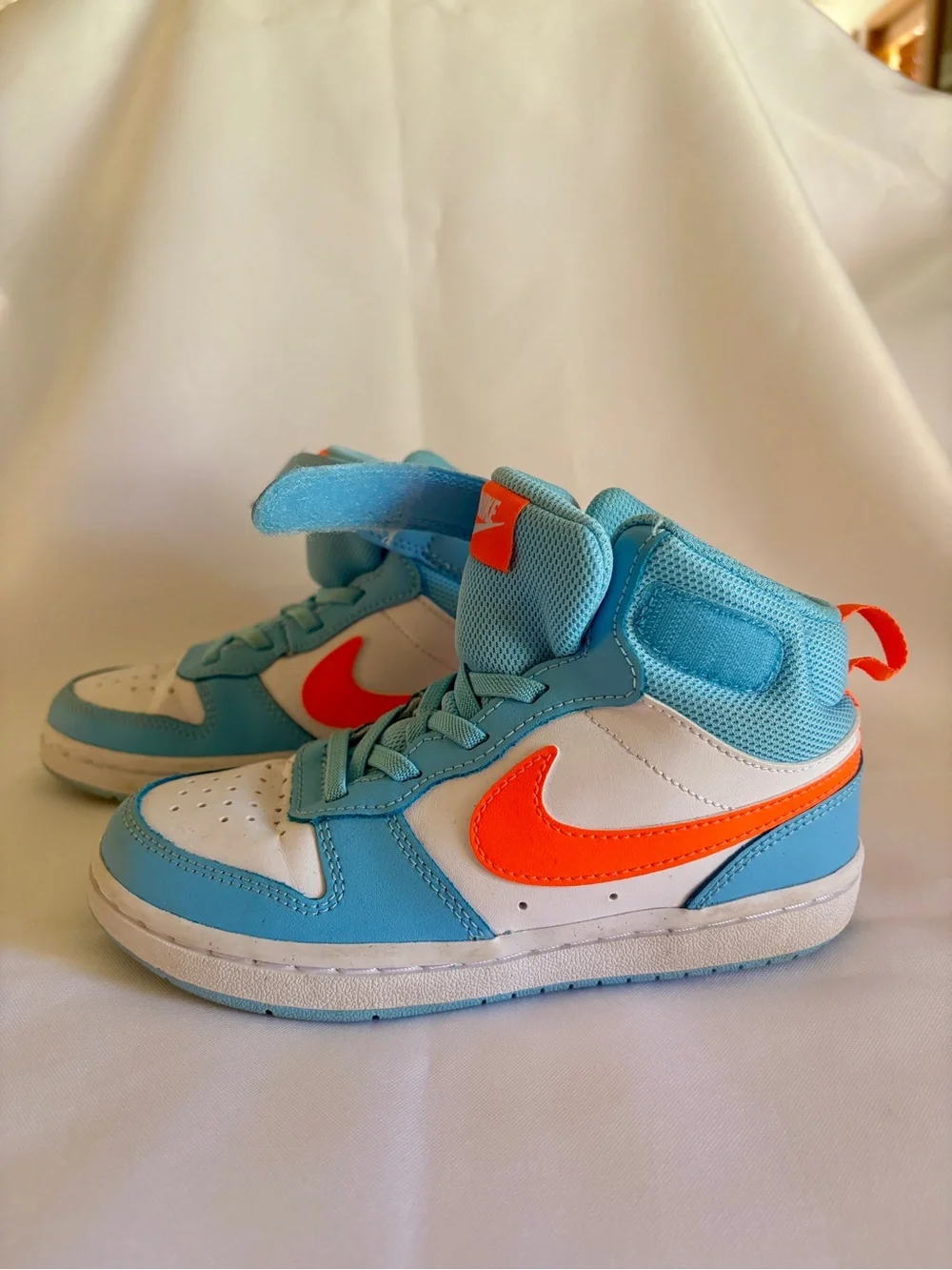 Nike Kids Mid-Top Sneakers in Aqua, White & Bright Orange